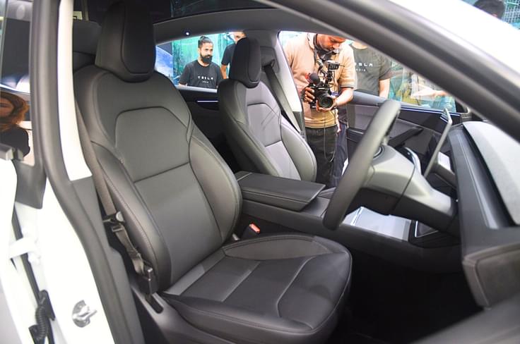 Both front seats are heated, ventilated and powered. Tesla Model Y front seats